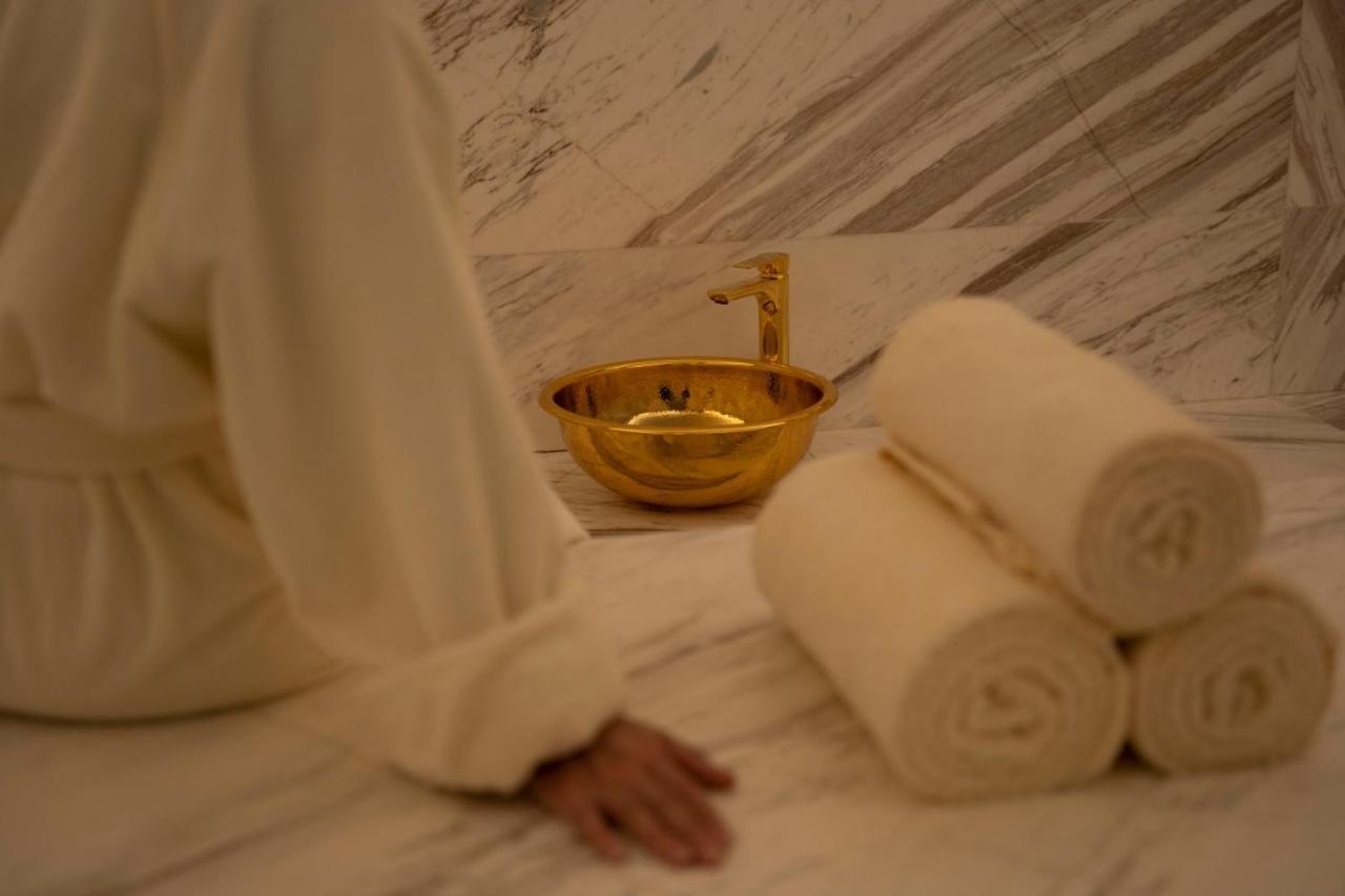 Jareed Hotel Ер-Ріяд Екстер'єр фото A golden bowl with a tap